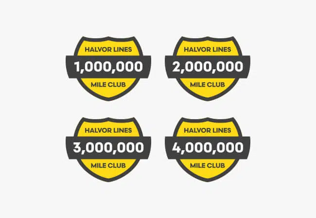Examples of the 1, 2, 3 and 4 million mile stickers awarded to drivers who reach these driving milestones.